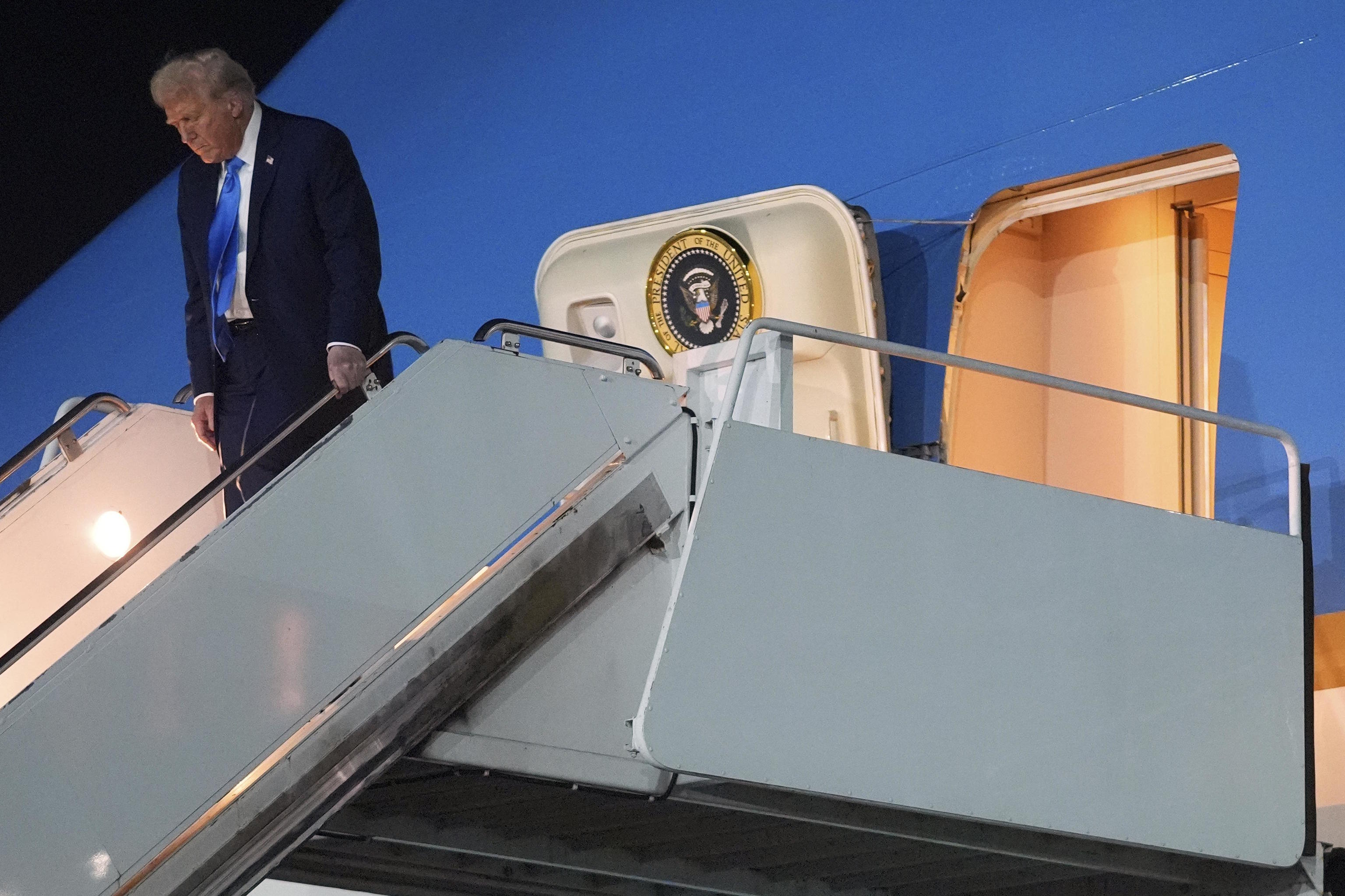 US President Donald Trump arrives on Air Force One.