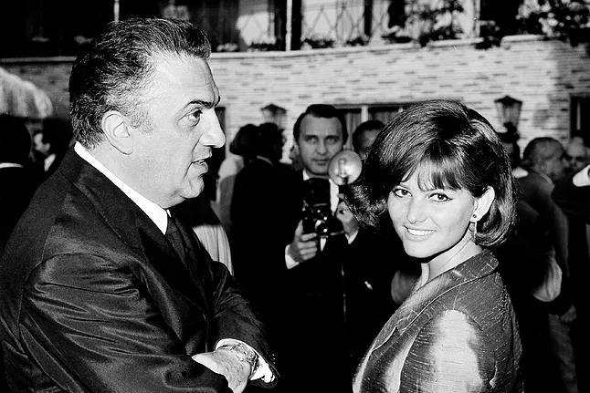 Claudia Cardinale with Federico Fellini during the 1964 Oscar ceremony.