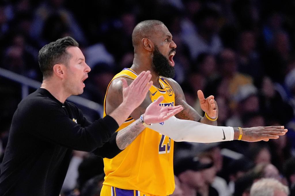 Los Angeles Lakers head coach JJ Redick, left, and forward LeBron James