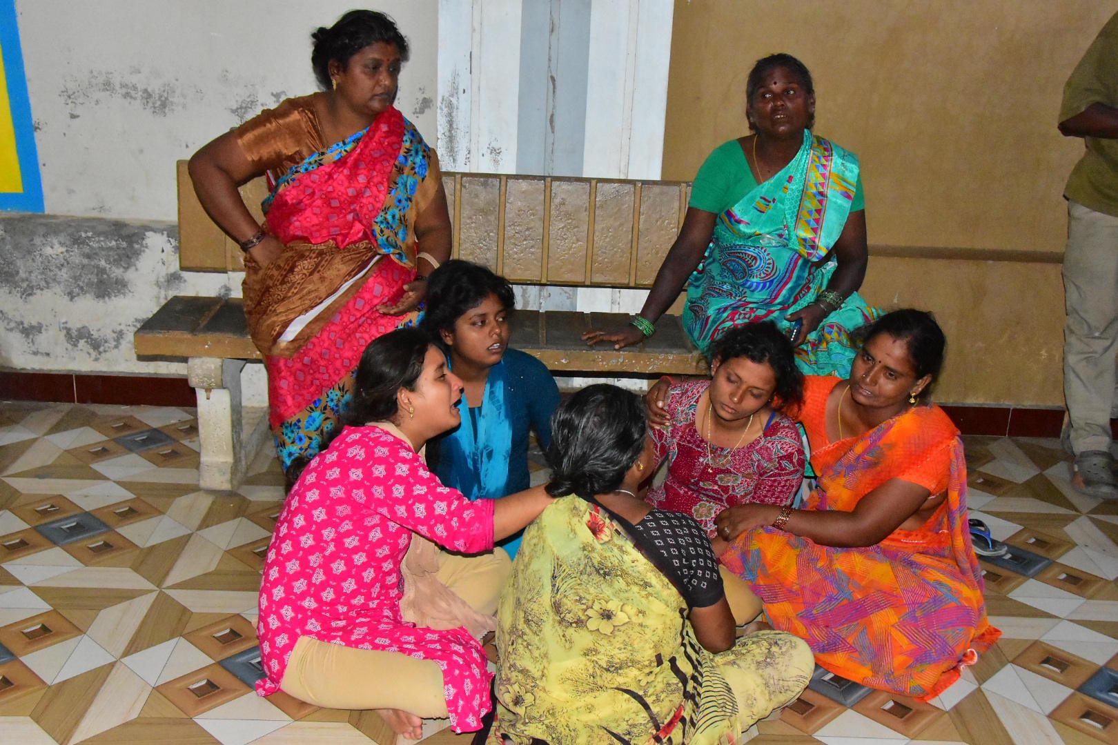 Relatives of people who were killed in a stampede.