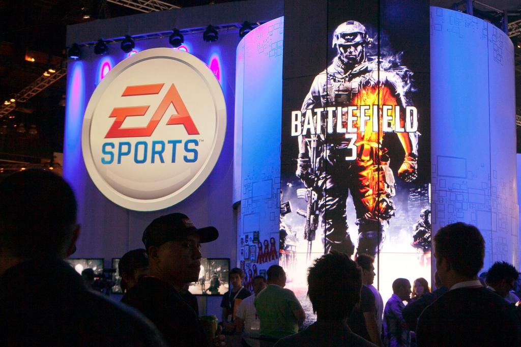 Attendees line up at the Electronic Arts booth to play the Battlefield 3 video game at the Electronic Entertainment Expo in Los Angeles