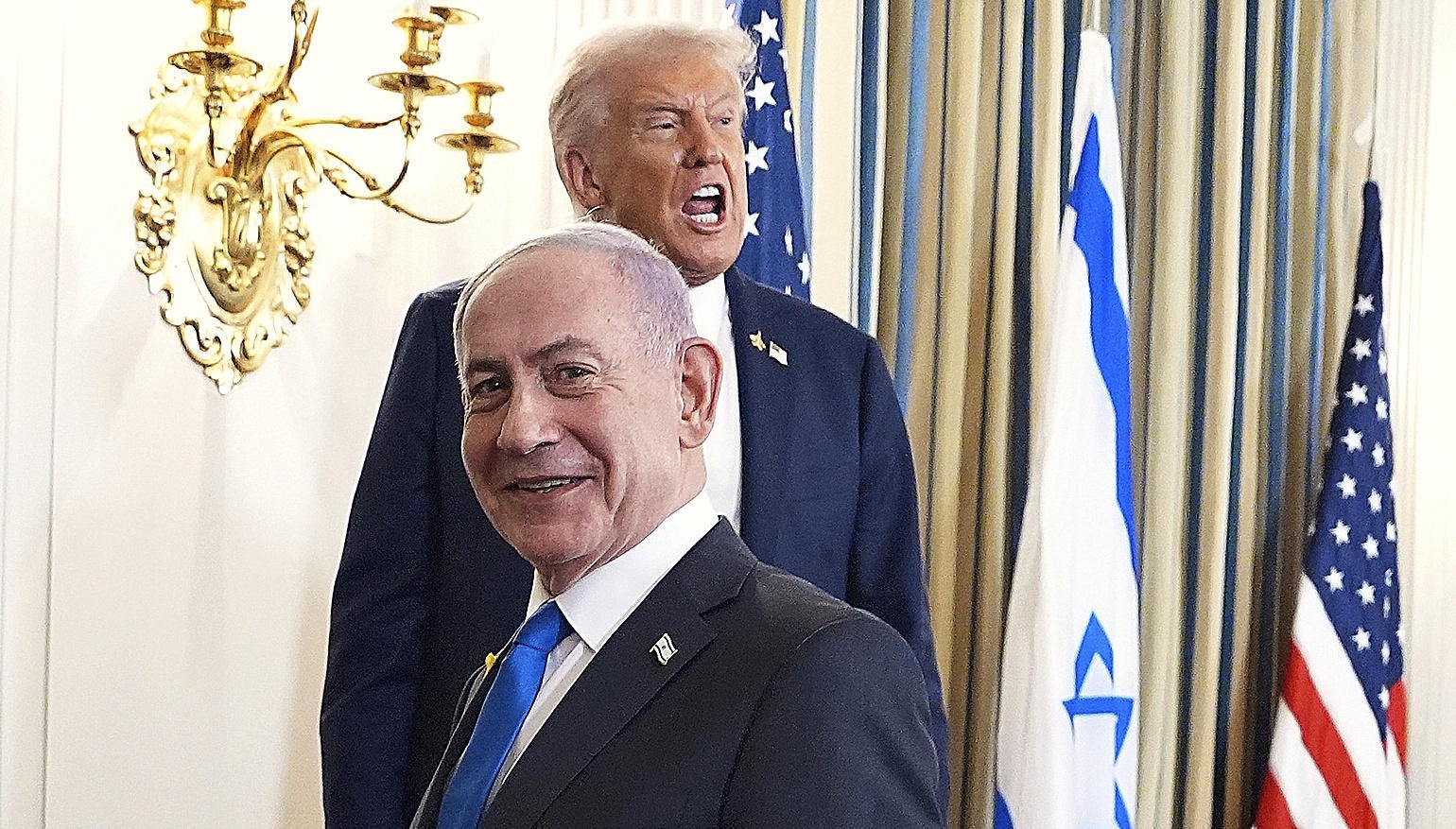 Trump speaks during a news conference with Benjamin Netanyahu.