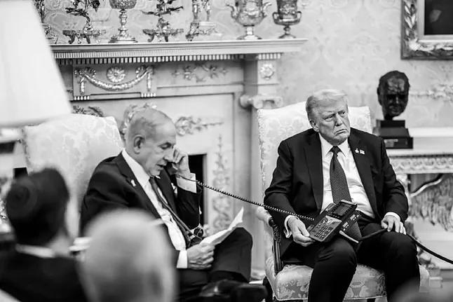 Photograph distributed by the White House showing Trump holding the phone for Netanyahu.