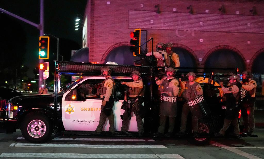 Los Angeles County Sheriff's deputies arrive to respond to ICE protests
