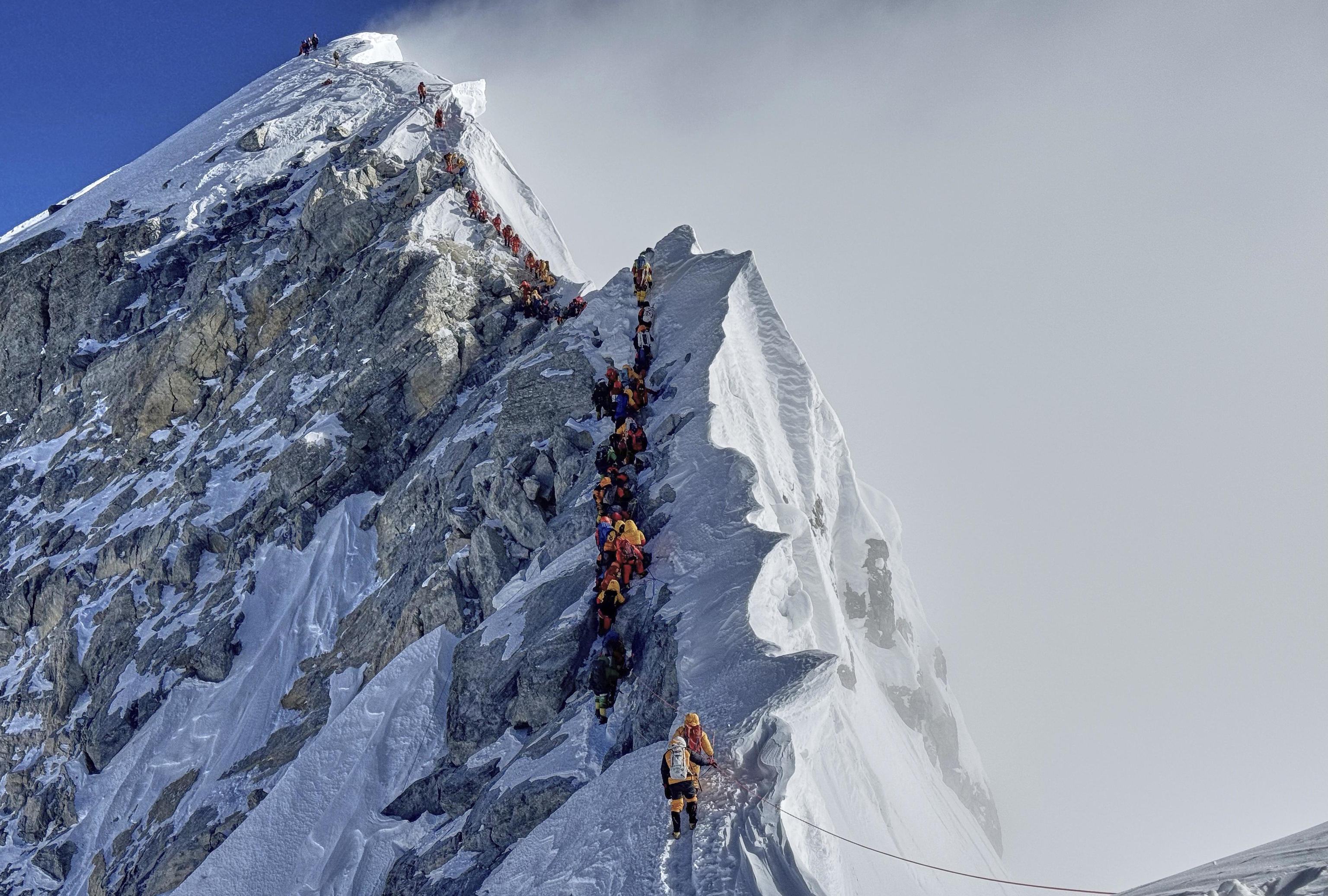 Hundreds of trekkers stranded on Everest by heavy snowfall.