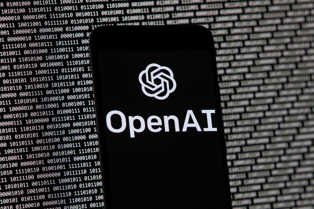 The OpenAI logo appears on a mobile phone.