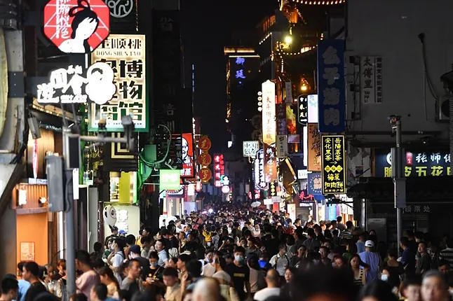 A bustling street in Changsha, in the province of Henan, eastern China.