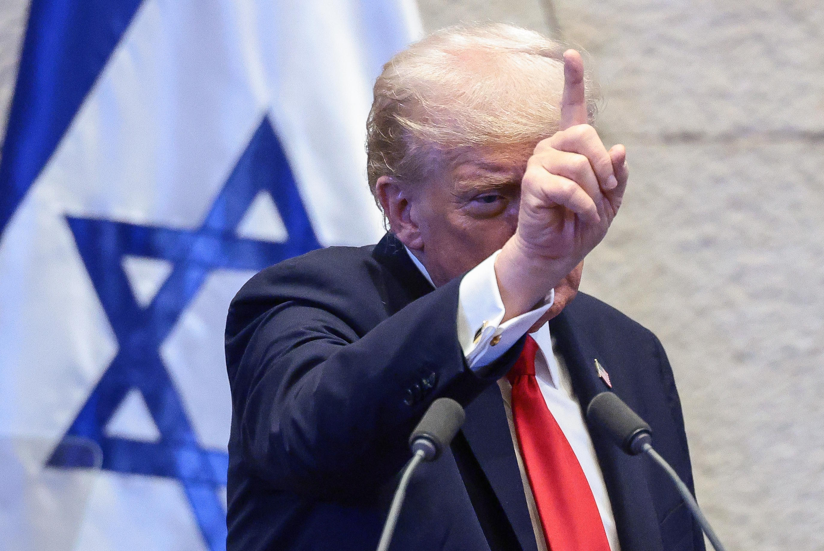 President Donald Trump speaks at the Knesset, Israel's parliament.