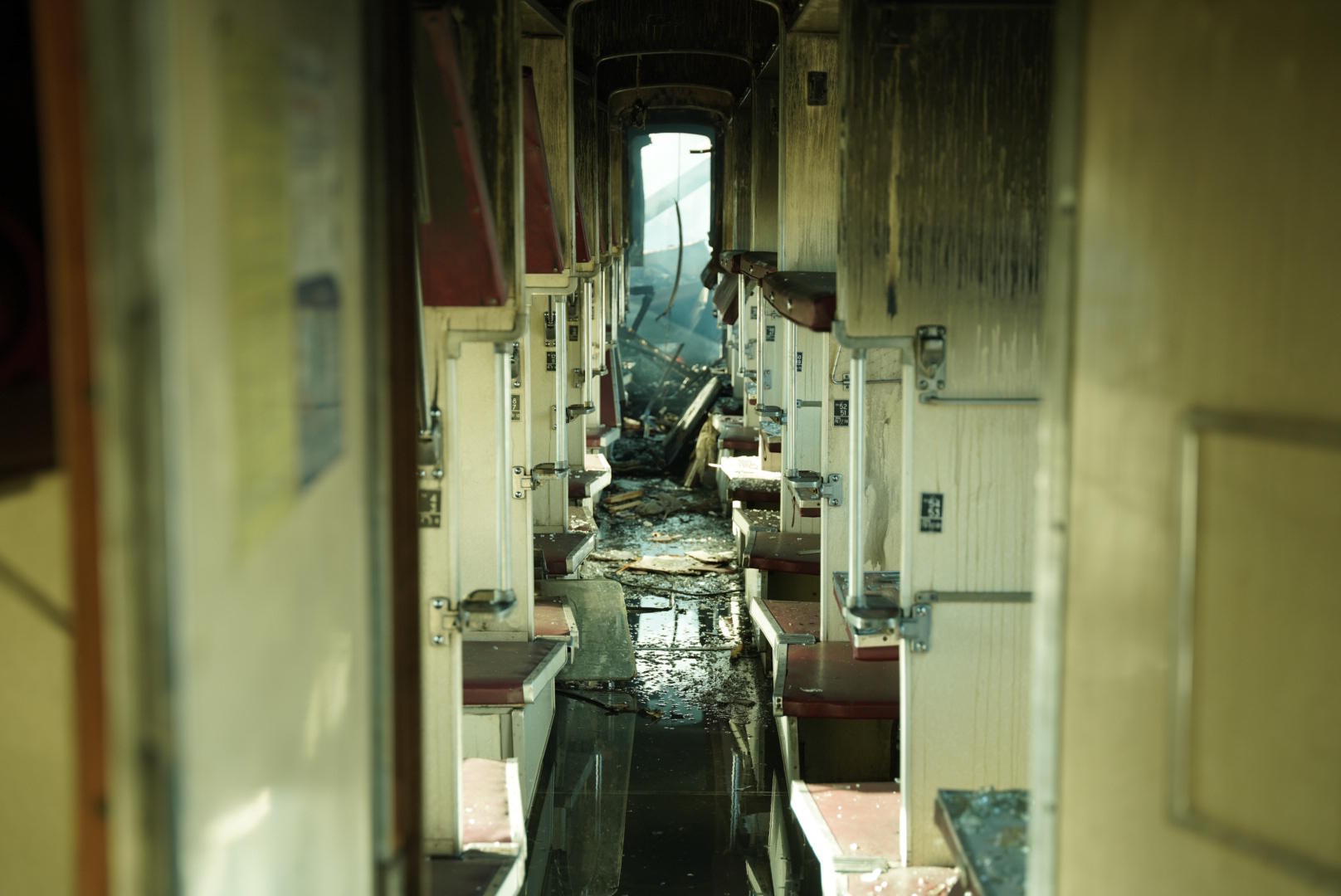 A passenger train is damaged following Russia's drone attack in Ukraine.
