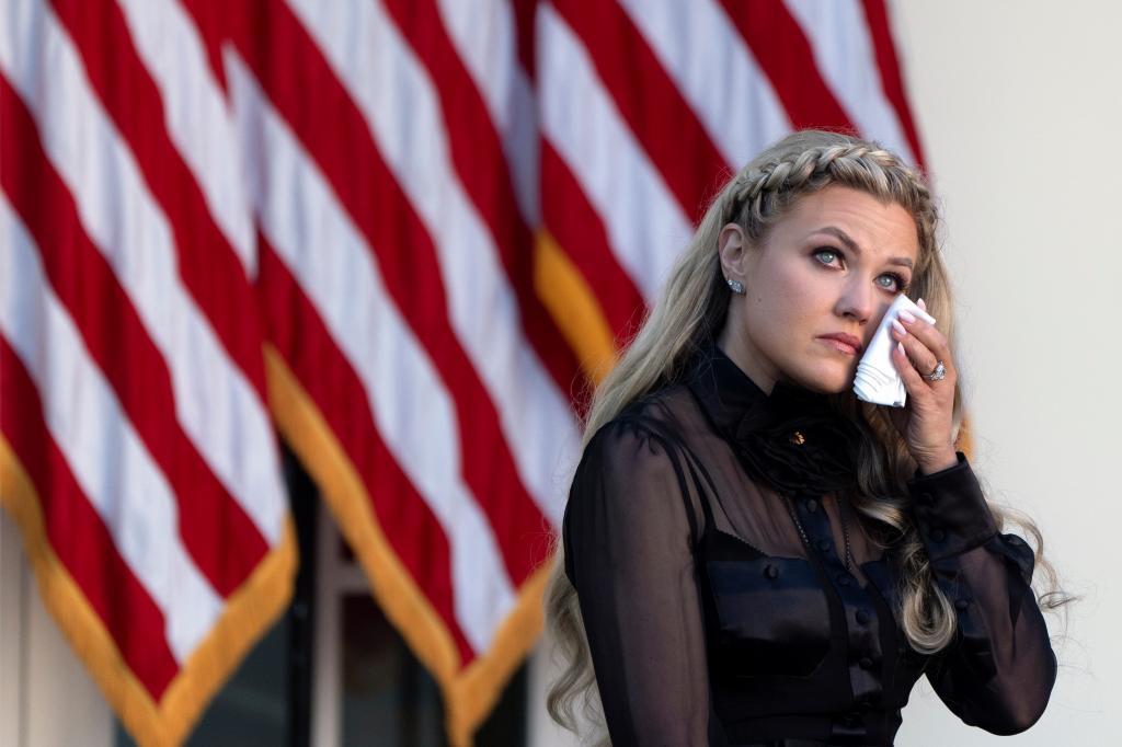 Erika Kirk reacts after President Donald Trump posthumously awarded the Presidential Medal of Freedom to her late husband Charlie Kirk