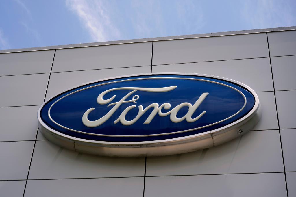 The Ford logo is seen above the entrance to the Ford Motor Company Kentucky Truck Plant