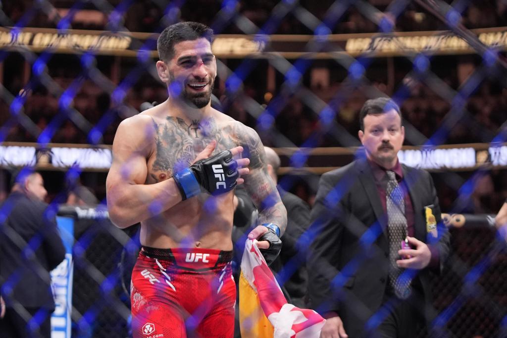 Ilia Topuria celebrates after knocking out Alexander Volanovski