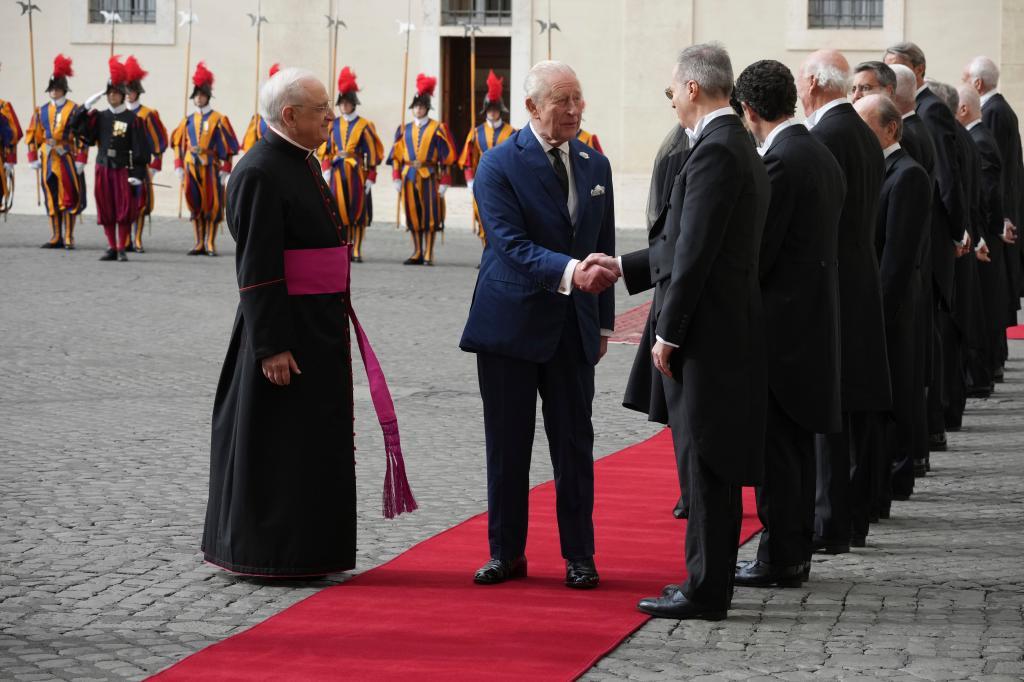 Britain's King Charles III and Queen Camilla arrive in the St. Damasus Courtyard at the Vatican