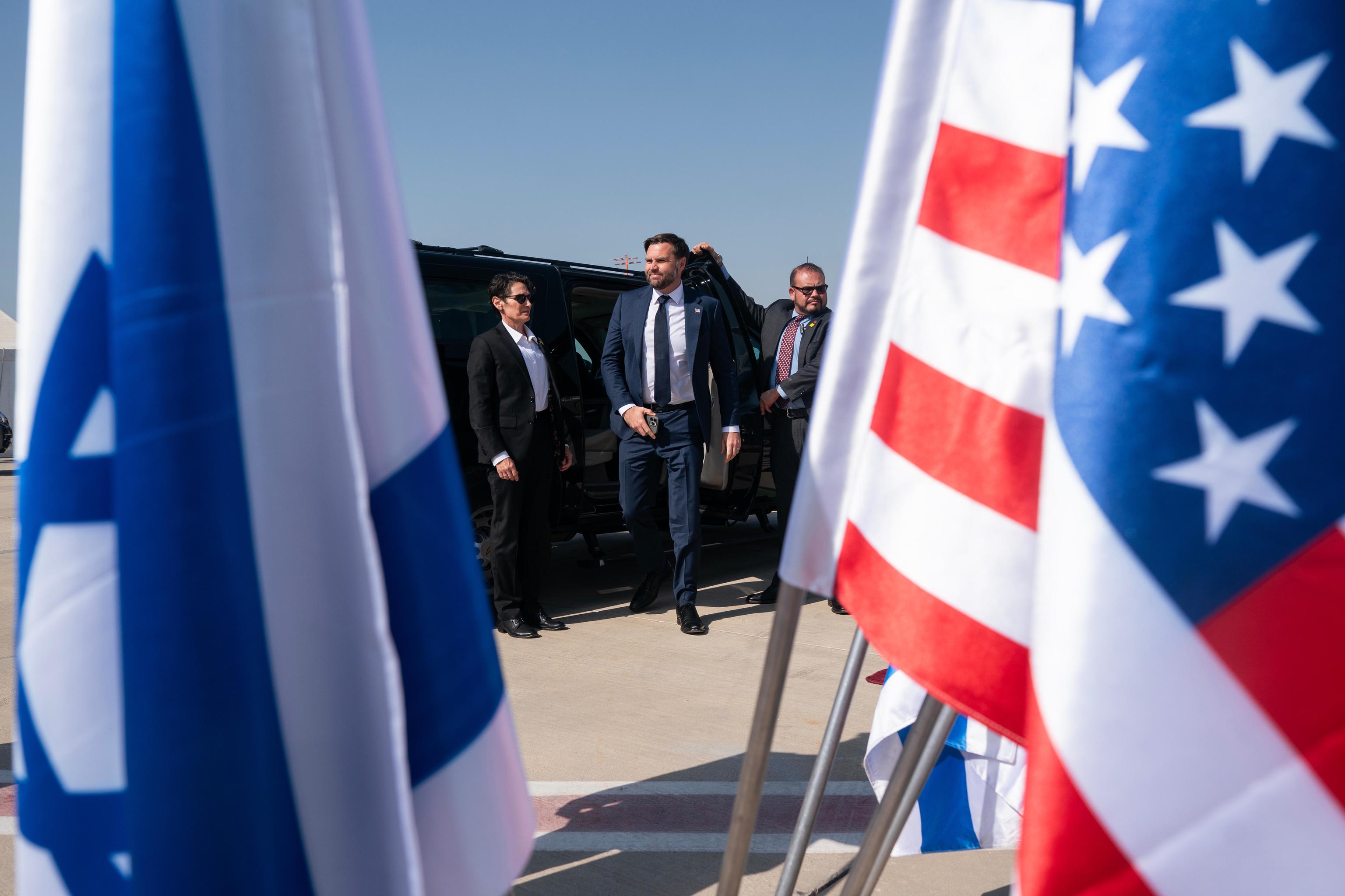 US Vice President JD Vance exits his motorcade before boarding Air Force Two in Tel Aviv.