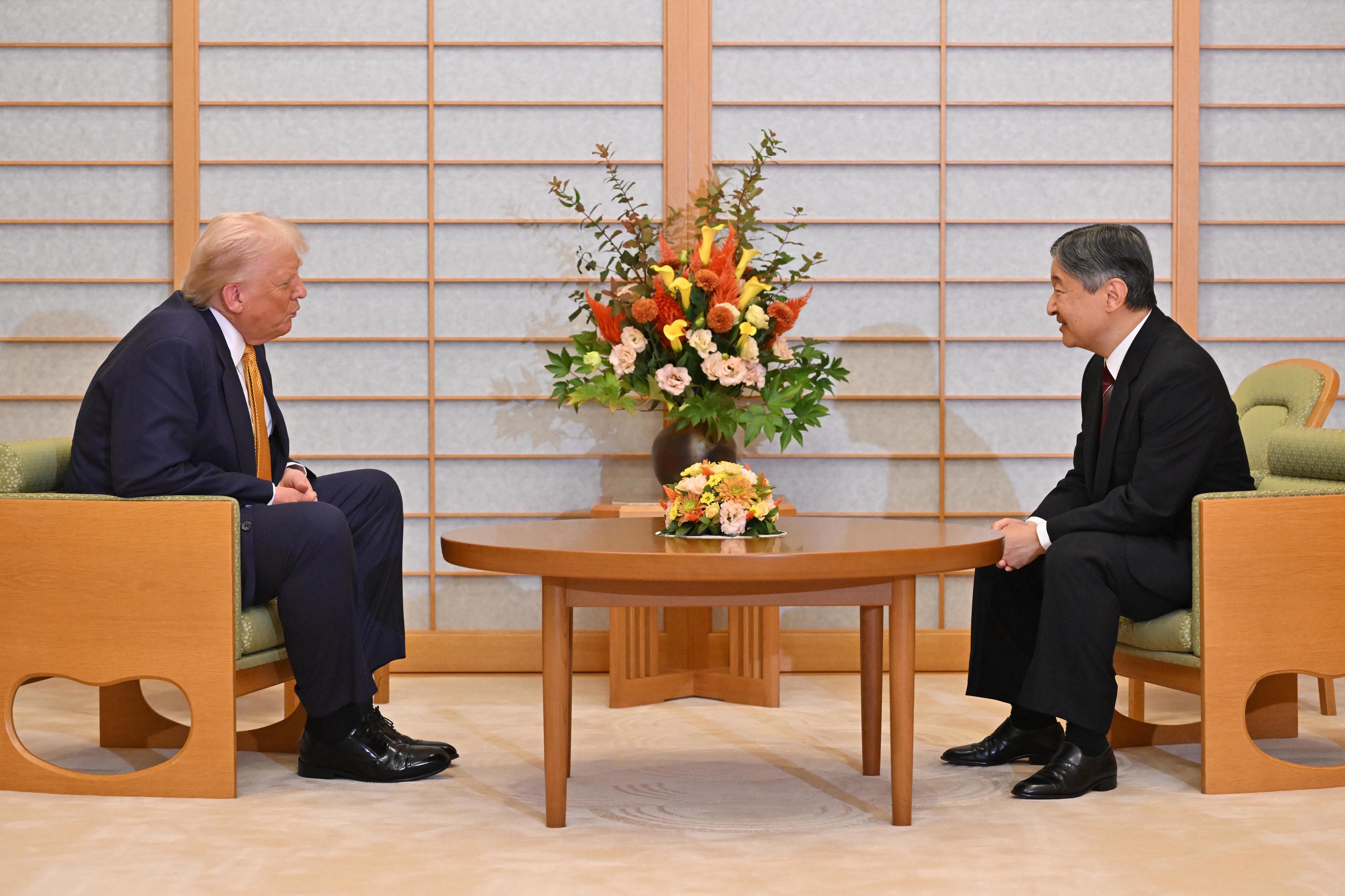 President Donald Trump, left, and Japan's Emperor Naruhito.