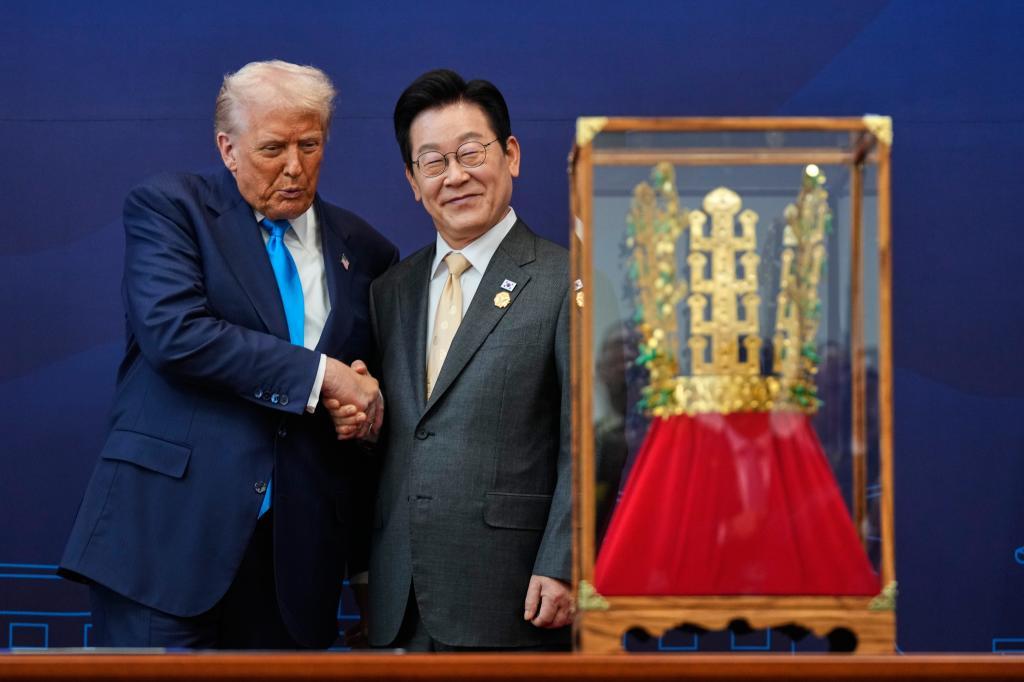 President Donald Trump shakes hands with South Korean President Lee Jae Myung