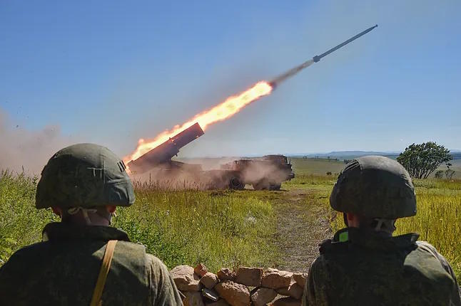 Russian troops launch a missile.