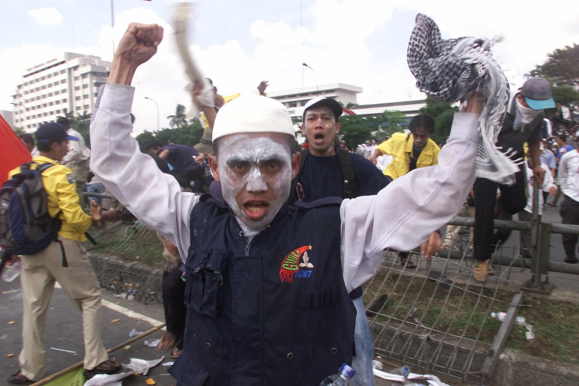 Indonesian university students attempt to storm the Parliament in Jakarta.