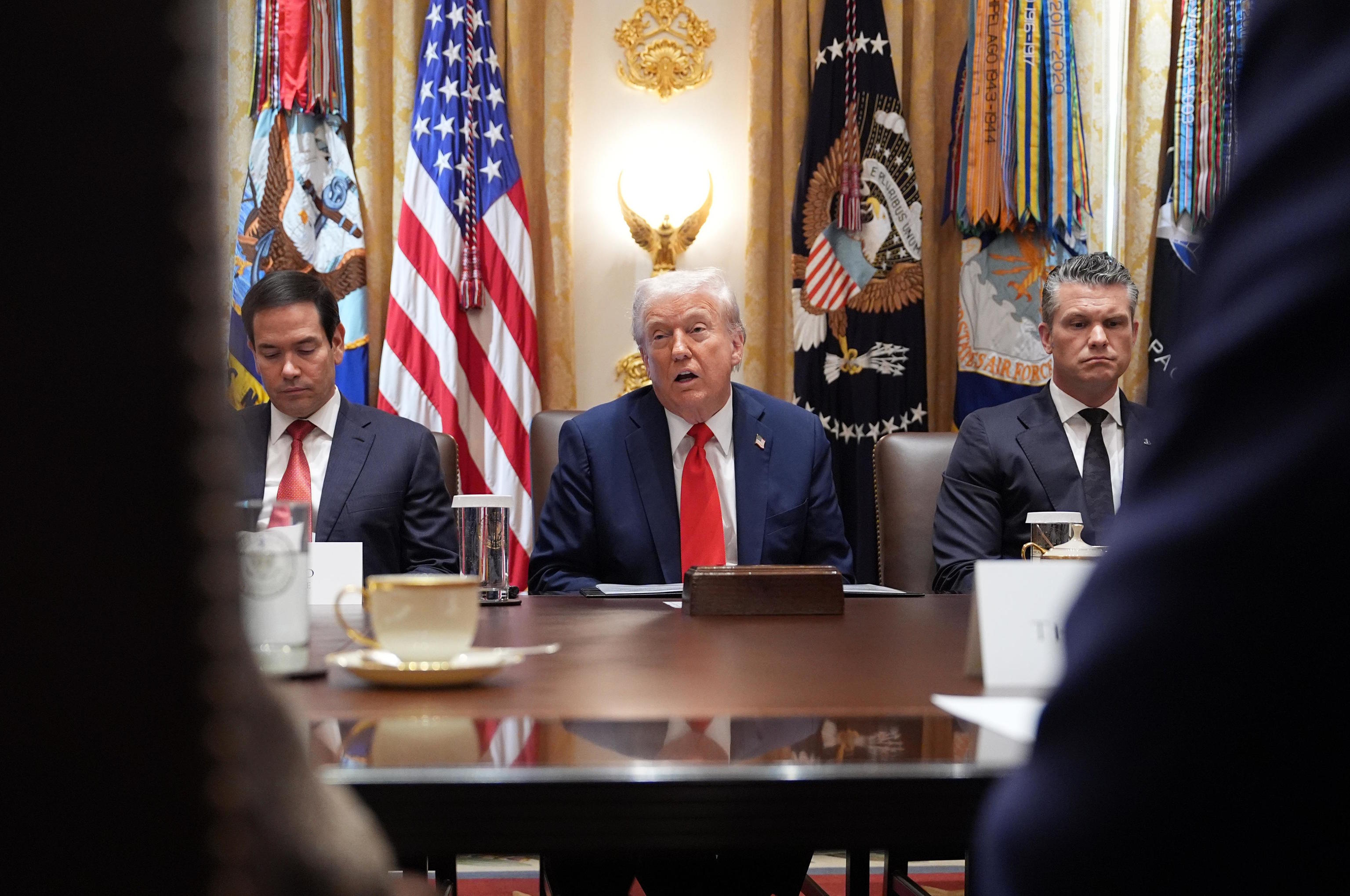 President Trump speaks during a cabinet meeting at the White House.