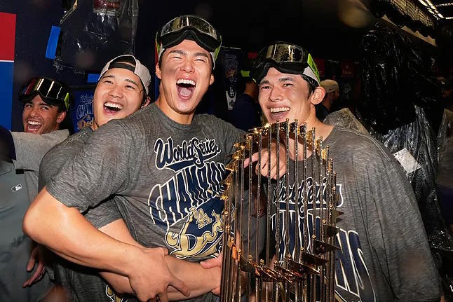 Ohtani, Yamamoto, and Sasaki celebrating the title.
