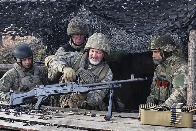 Ukrainian Soldiers Practice with a Belgian Multipurpose Machine Gun Near the Frontline in the Zaporiyia Region.