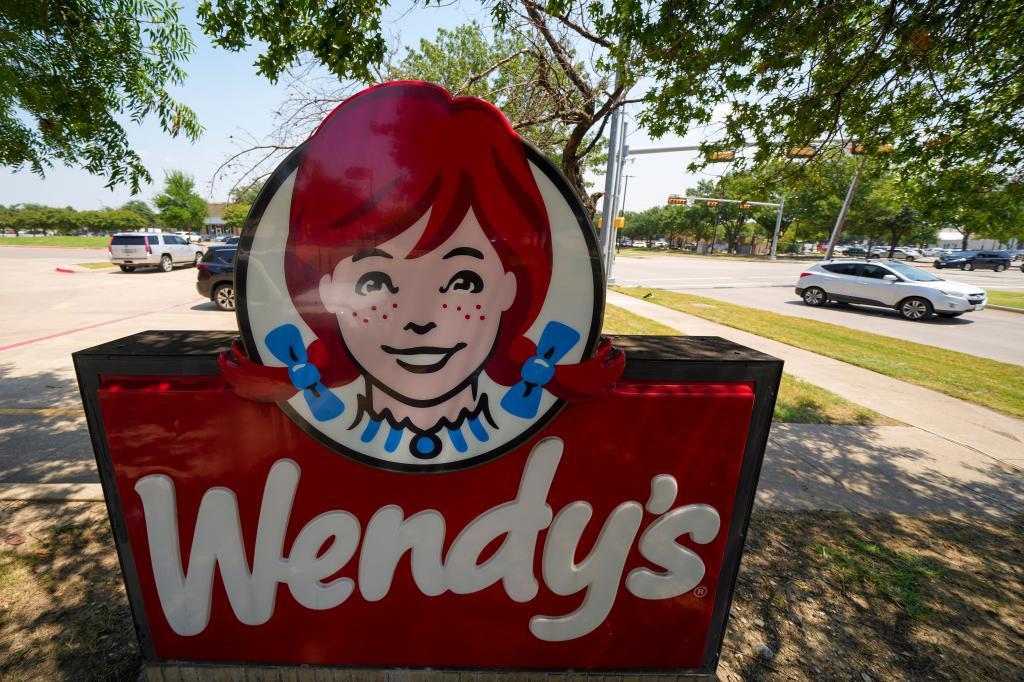 A sign is seen at a Wendy's restaurant.