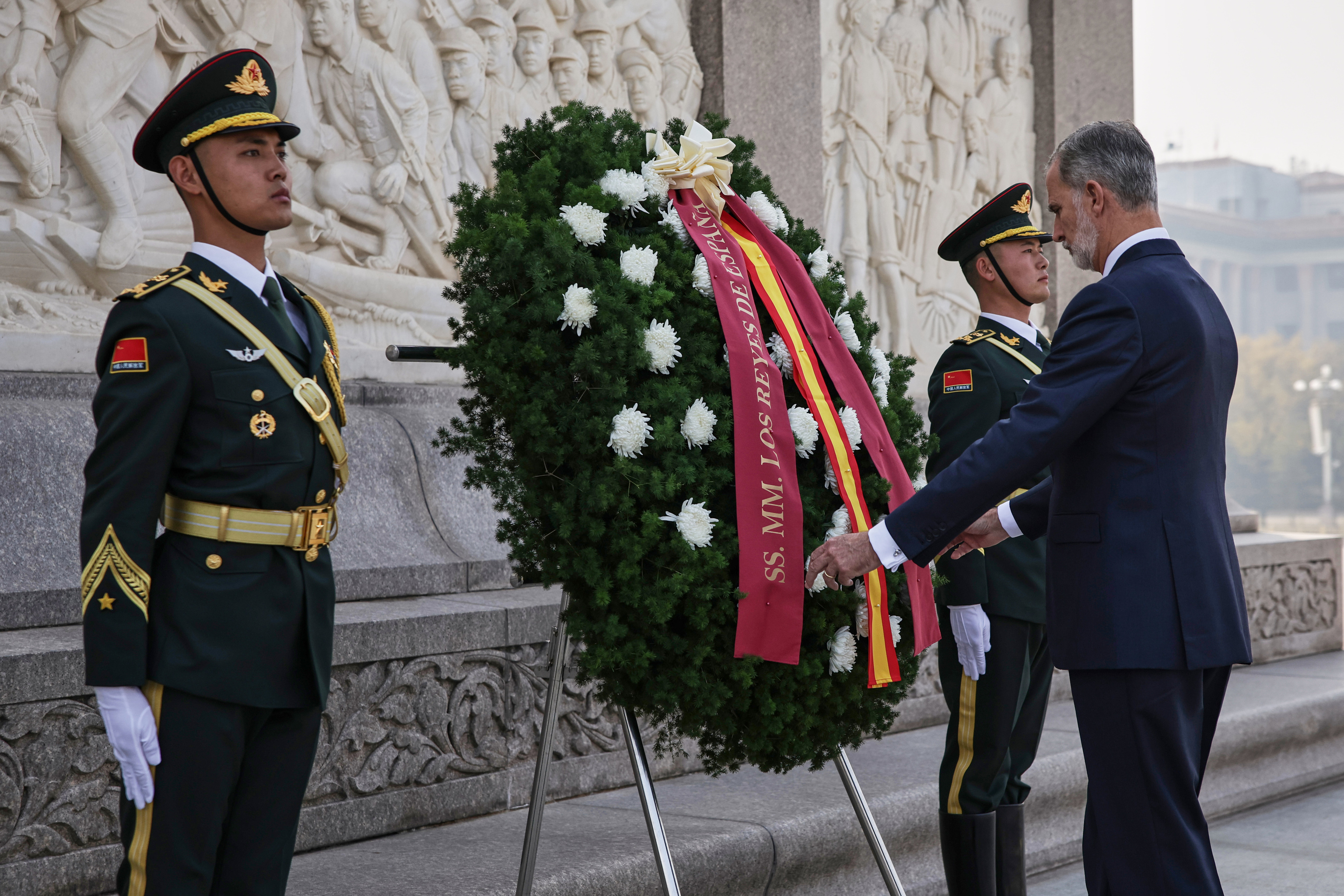 Spain's King Felipe VI, during a flower wreath ceremony at the Monument to the People's Heroes, in Tiananmen Square.