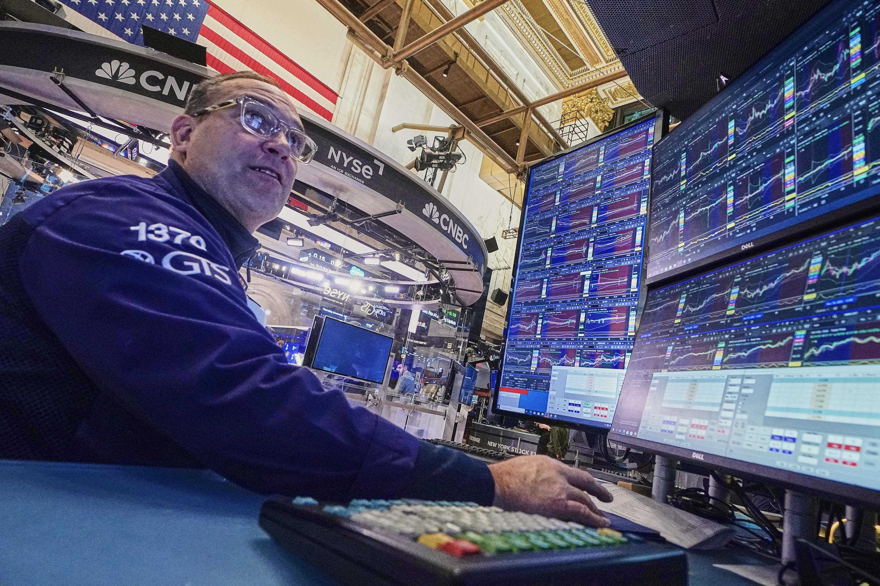 Specialist works on the floor of the New York Stock Exchange.
