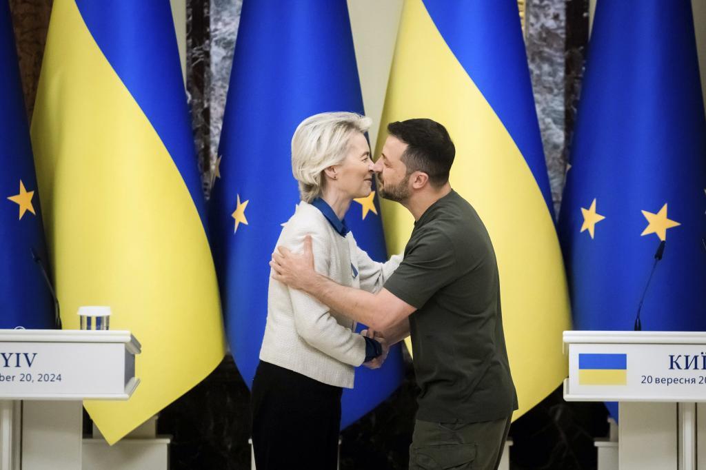 Ukrainian President Volodymyr Zelenskyy, right, and European Commission President Ursula von der Leyen