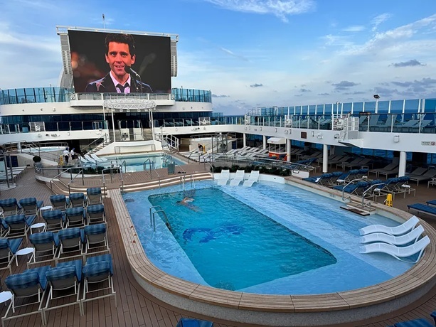 Outdoor pool with background music.