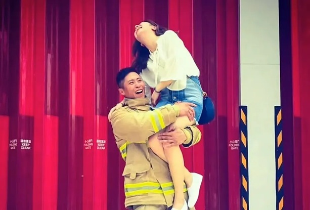 Firefighter Ho with his girlfriend, in an image she posted on social media.