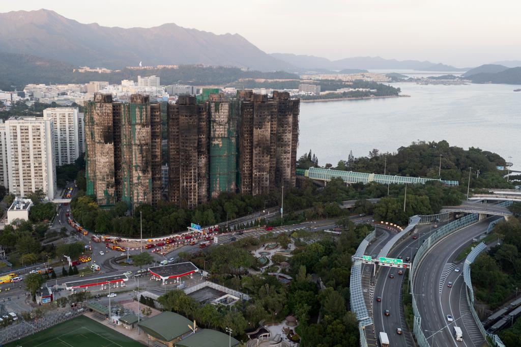 An aerial view of the burnt buildings after a deadly fire