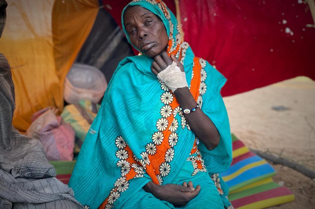 An injured Sudanese woman who fled el-Fasher city, after Sudan's paramilitary forces killed hundreds of people in the western Darfur region