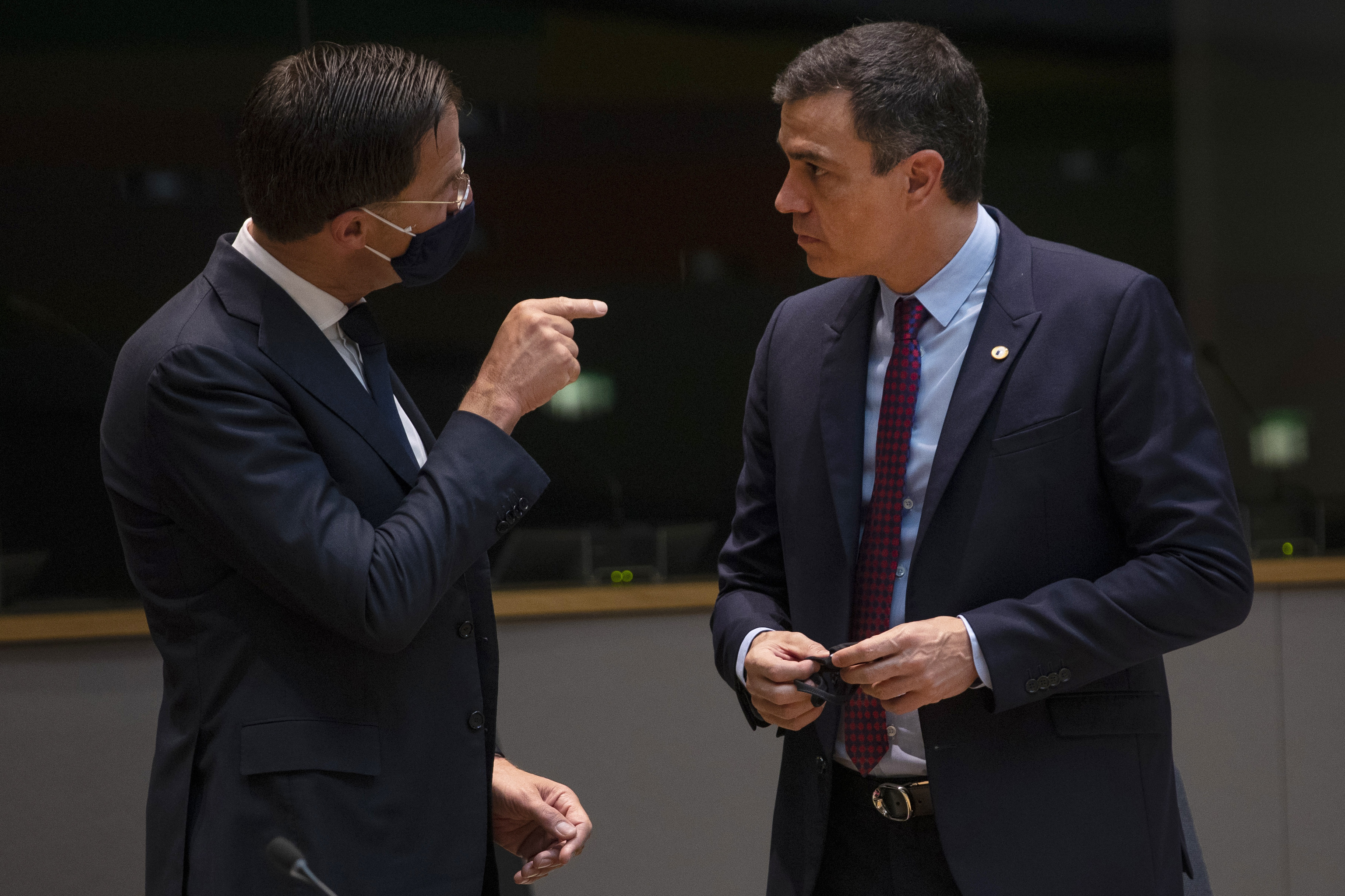 Dutch Prime Minister Mark Rutte, left, speaks with Spain's Prime Minister Pedro Sanchez.