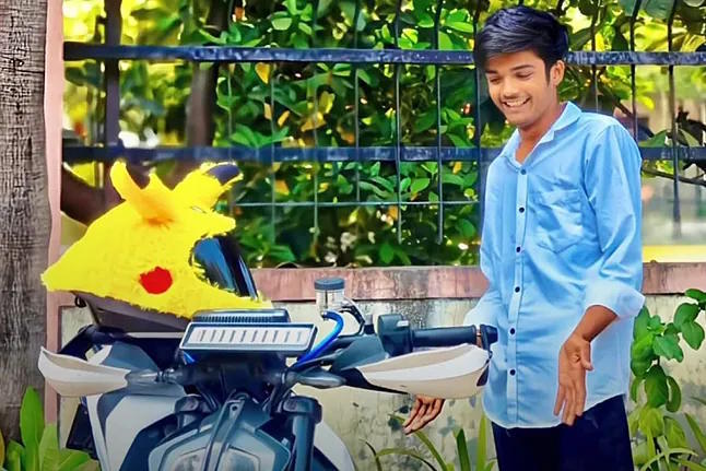 Prince Patel with his motorcycle.