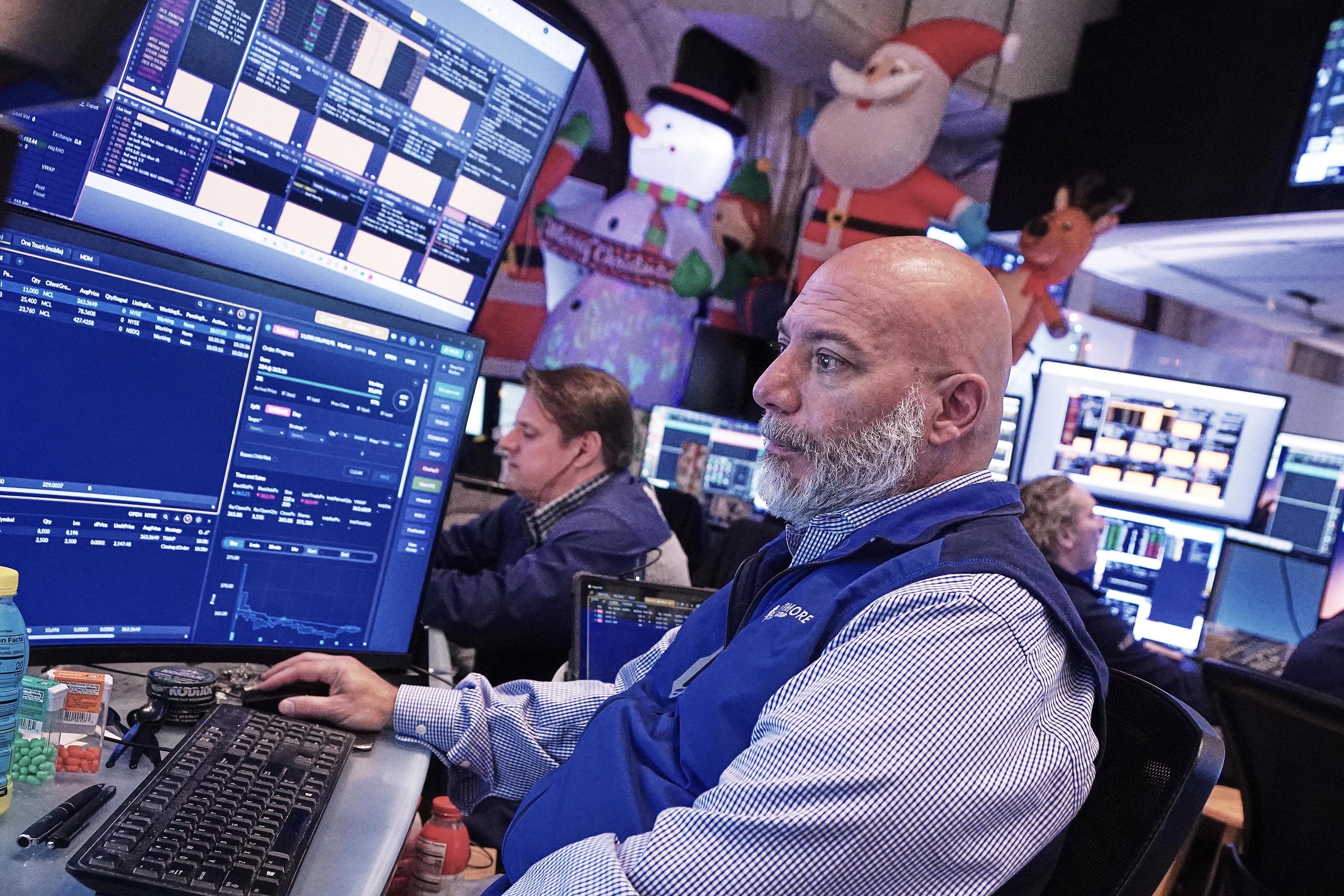 A trader works at the New York Stock Exchange.