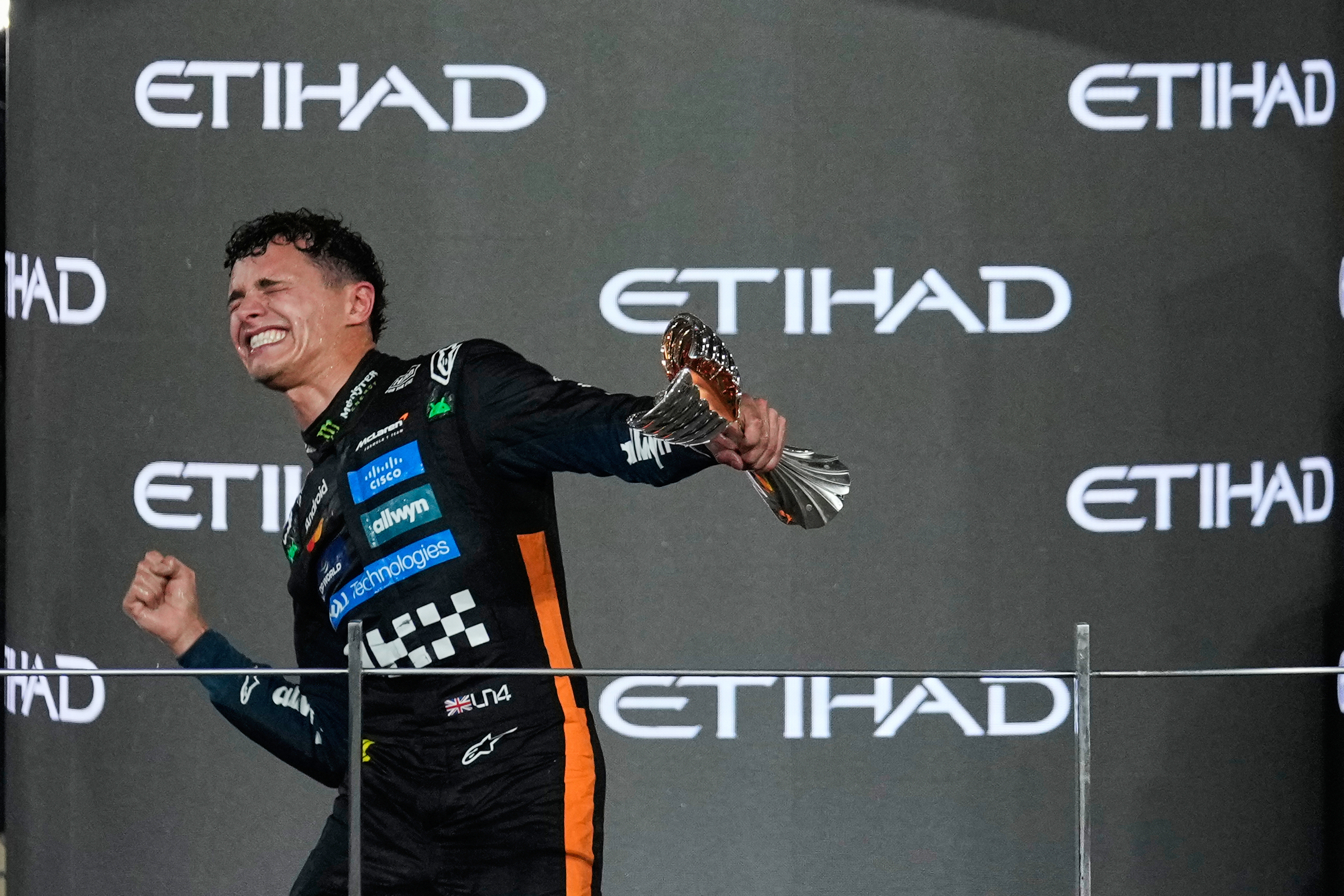 McLaren driver Lando Norris of Britain celebrates after becoming a world champion.