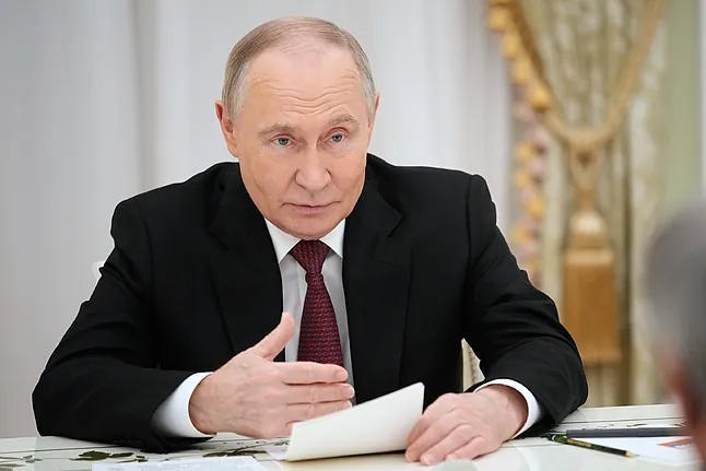 Putin, in a recent meeting at the Kremlin.