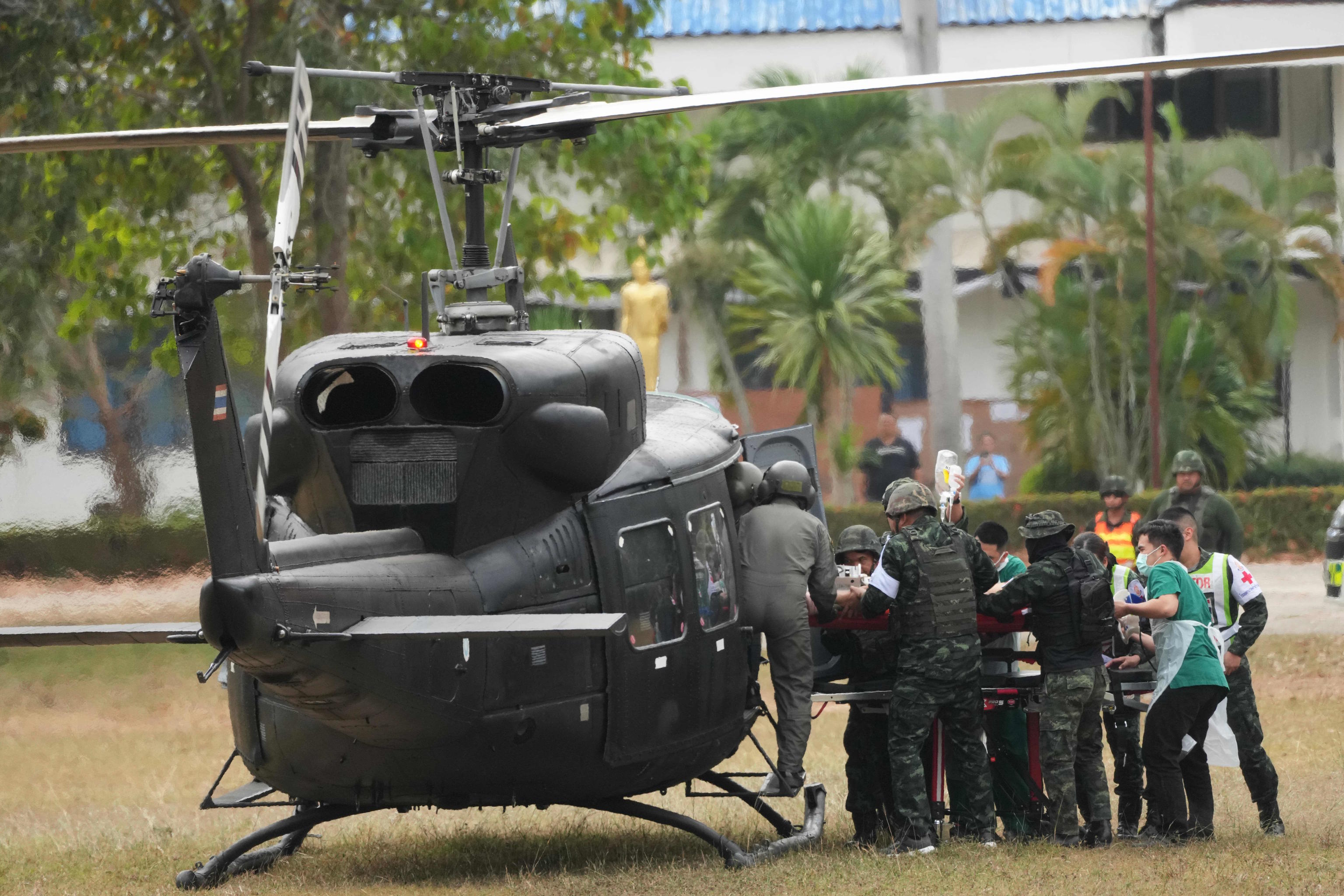 An wounded Thai soldier is carried to be transferred to a hospital.