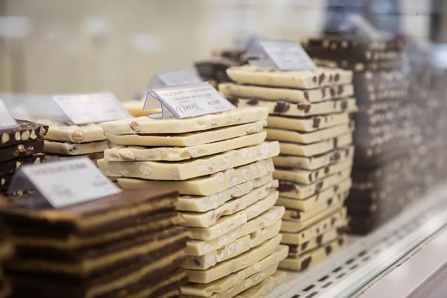 Variety of nougat displayed in a store.