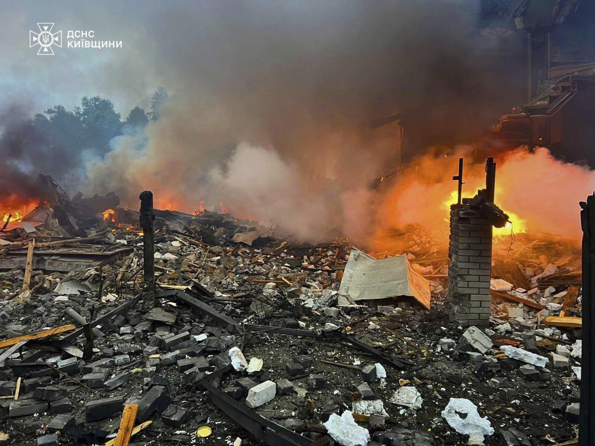 Private houses are seen ruined after a Russian drone attack in Kyiv region.