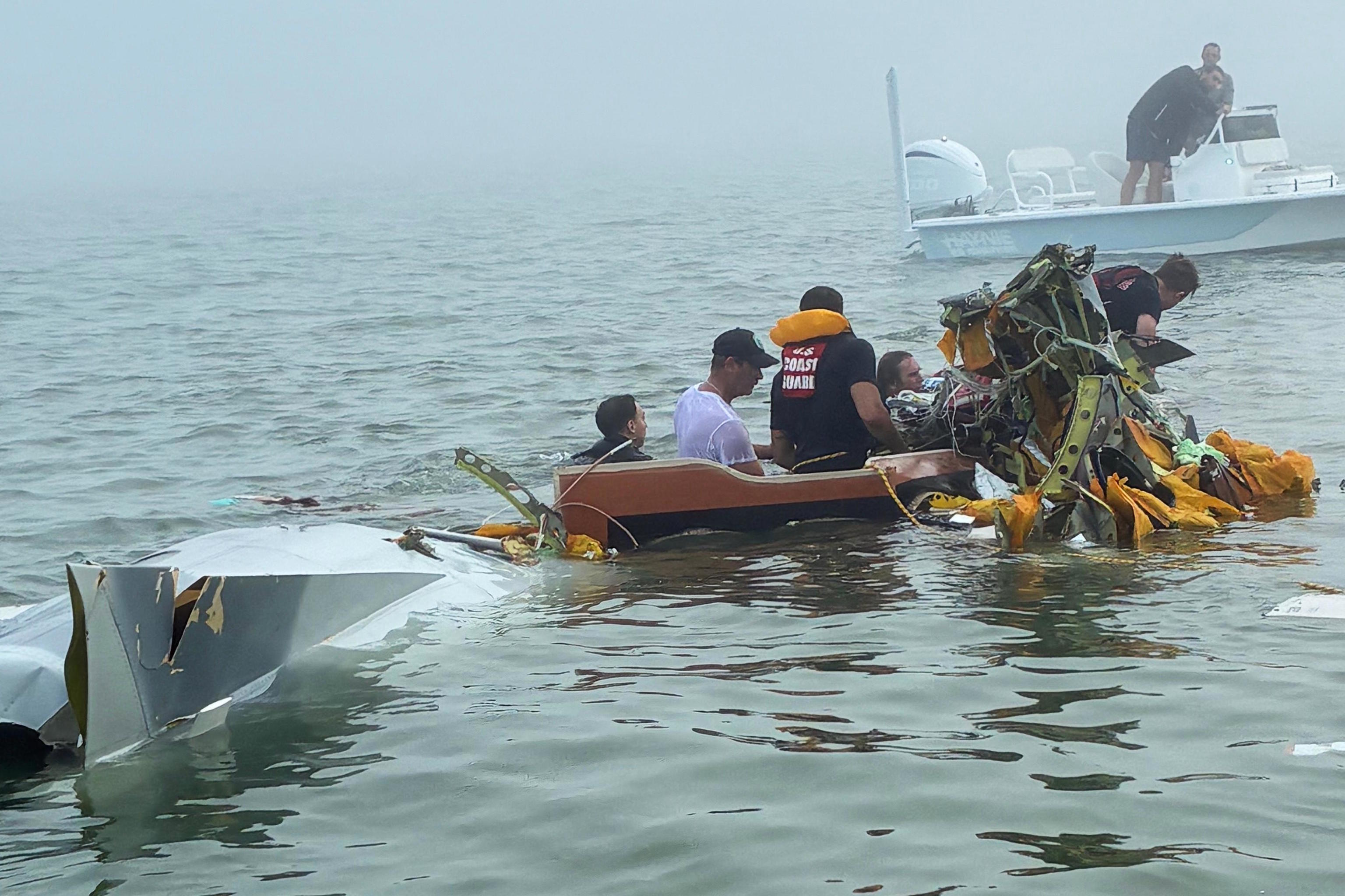 Volunteers respond to a Mexican Navy plane crash near Galveston, Texas.