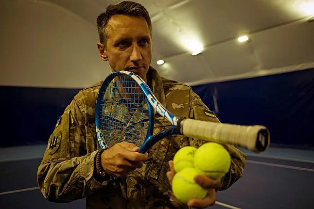 Sergiy Stakhovsky, with his uniform and racket.