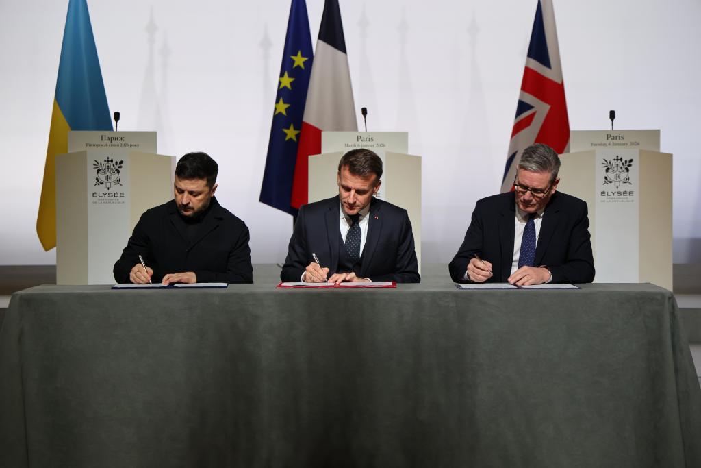 Ukraine's President Volodymyr Zelenskyy, left, France's President Emmanuel Macron and Britain's Prime Minister Keir Starmer