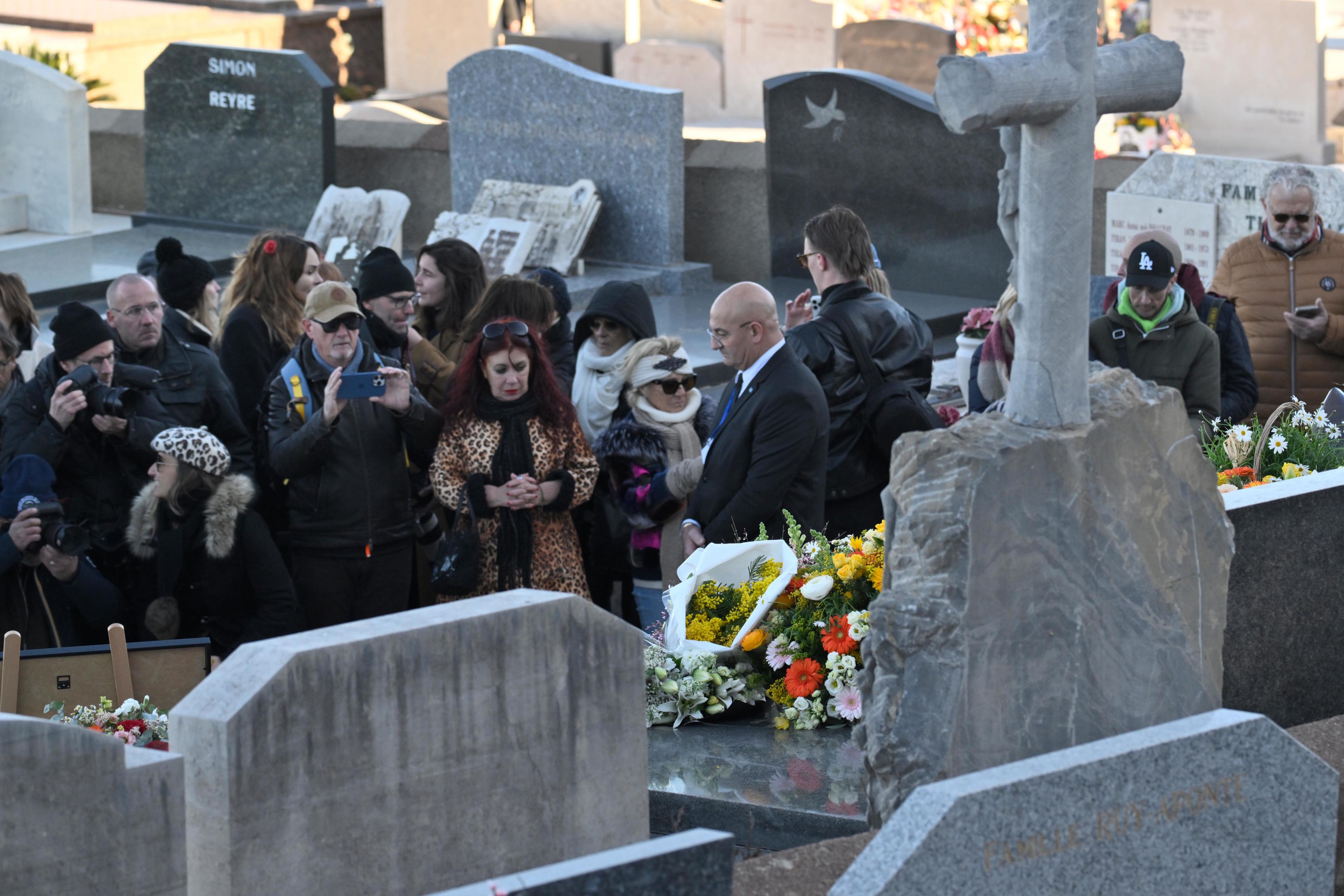People queue to pay their respects on actor Brigitte Bardot's tomb.