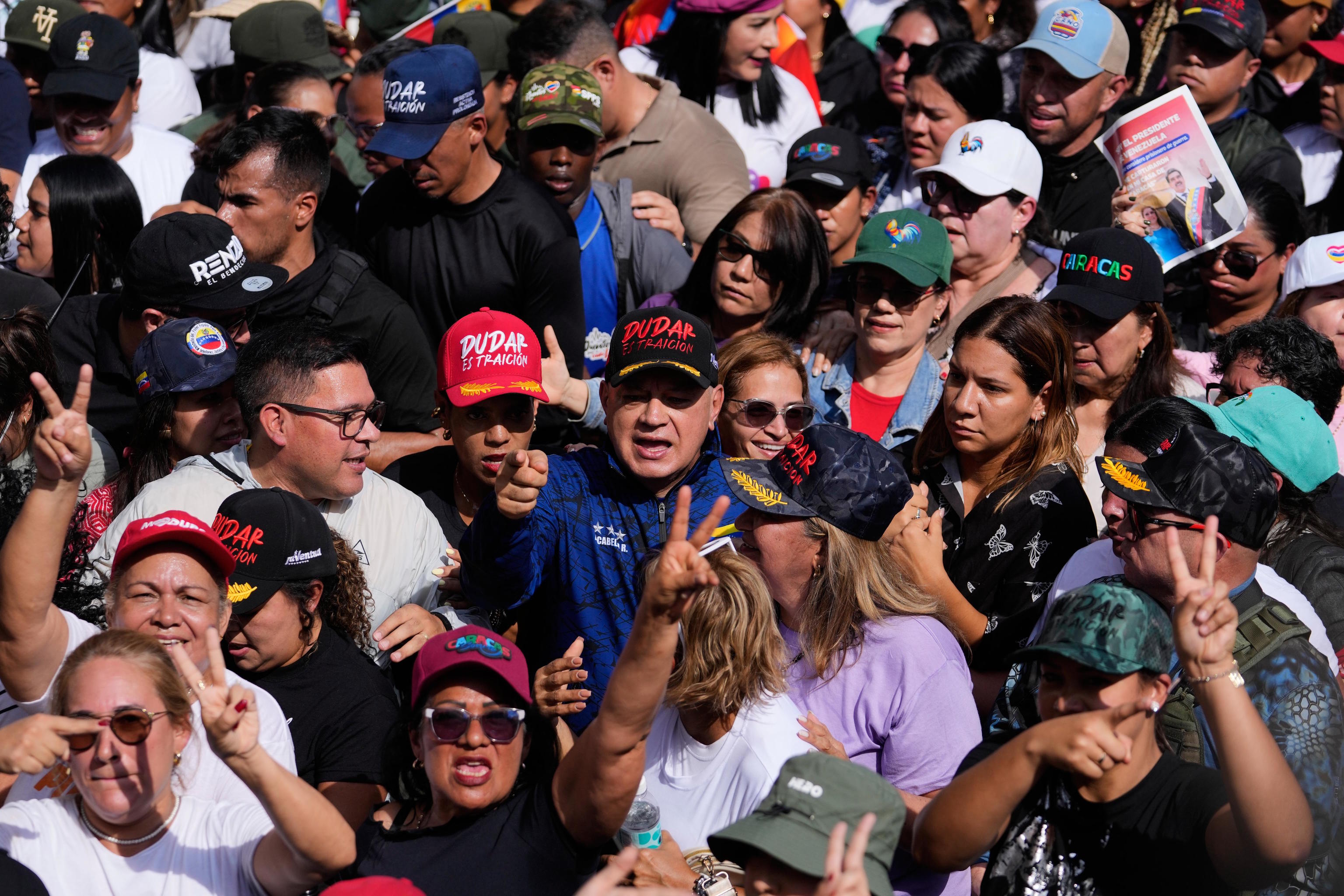 Venezuelan minister Diosdado Cabello attends a women's march in Caracas.