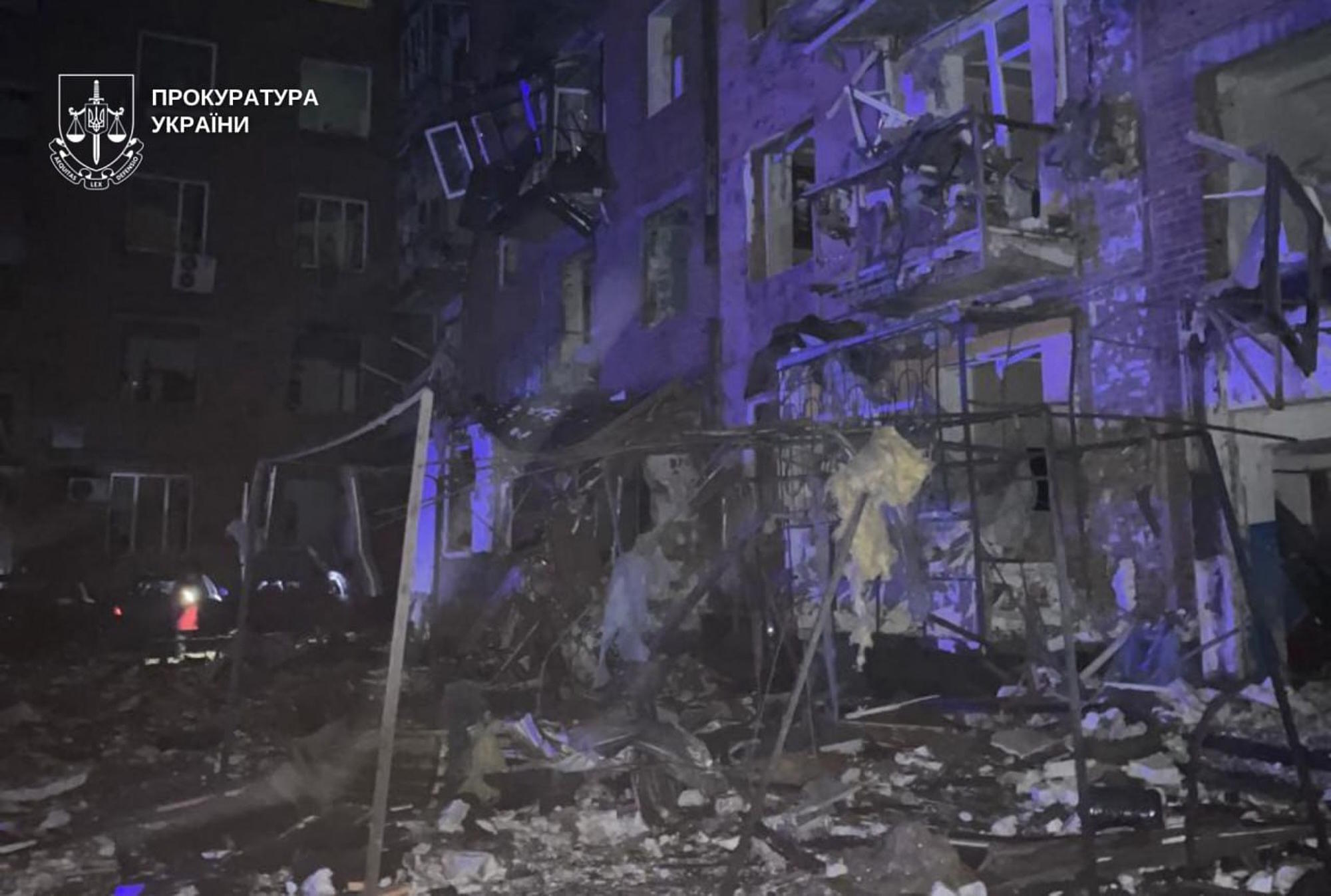 A damaged apartment building is seen following a Russian missile attack in Kryvyi Rih.