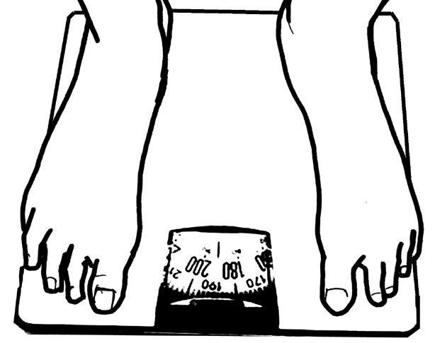 Feet on a weighing scale.