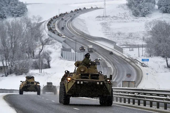 Several Russian vehicles on a road in Crimea.