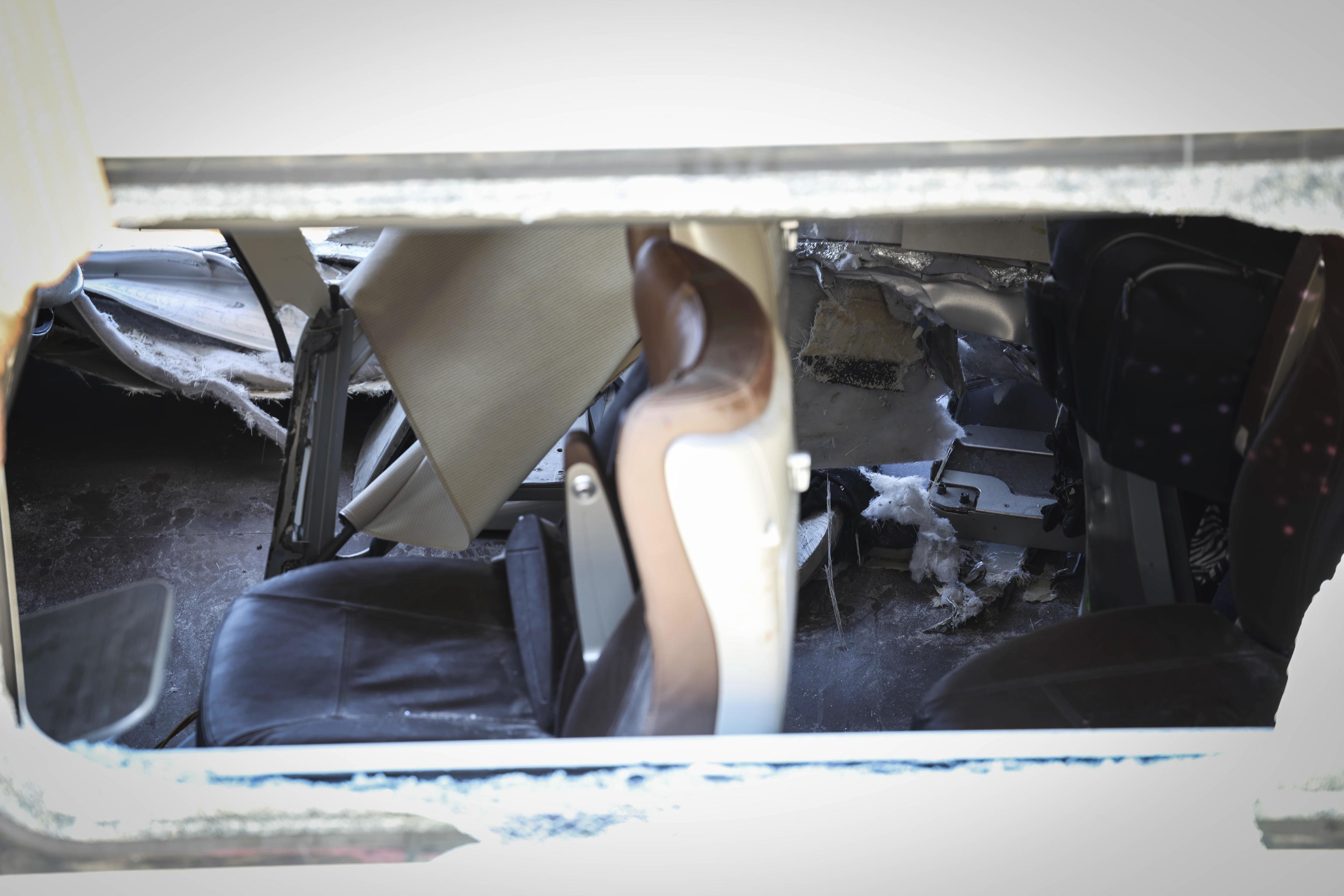 Window of one of the overturned train cars in the Adamuz train accident, Córdoba.